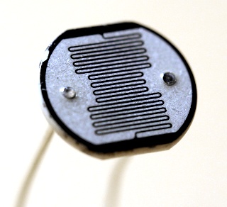Close-up photograph of a TO-8 cadmium selenide (CdSe) photocell