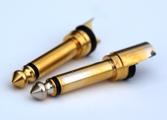 Gold plated jack plug after immersion in dilute hydrochloric acid for 24 hours.