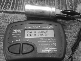 Dried out multi-section electrolytic capacitor